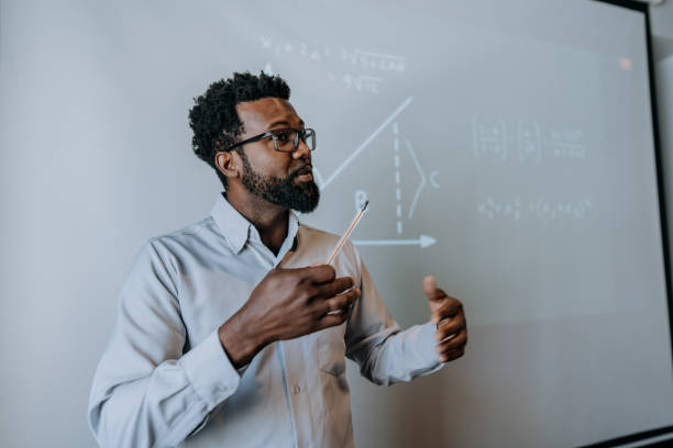 istock Portrait of a teacher teaching math 1465888847
