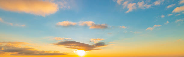 istock Clouds and evening sky,Real majestic sunrise sundown sky background with gentle colorful clouds without birds. Panoramic, big size 1465896551
