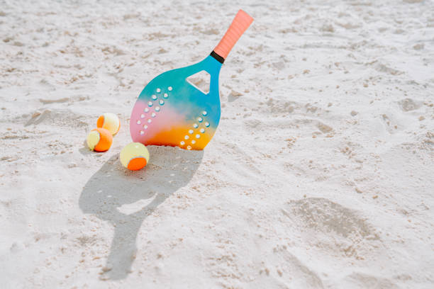 istock Beach tennis racket and balls 1465897343