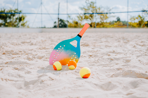 Beach tennis racket and balls