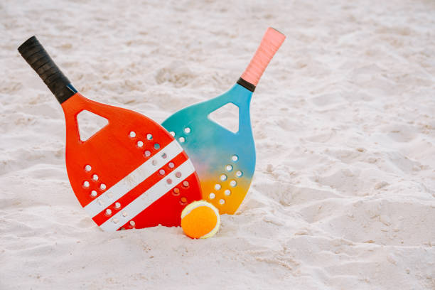 istock Beach tennis racket and balls 1465897456
