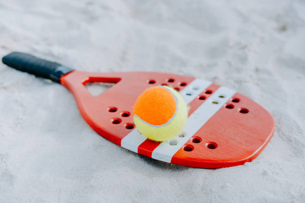 istock Beach tennis racket and balls 1465897470