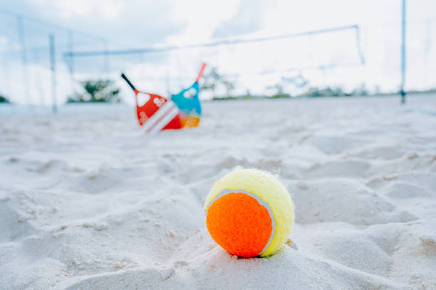 istock Beach tennis racket and balls 1465897474