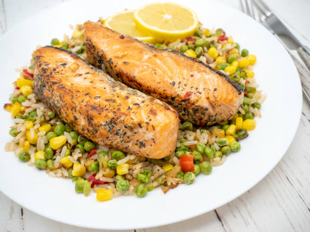 istock salmon steak on a bed of assorted vegetables 1465898913