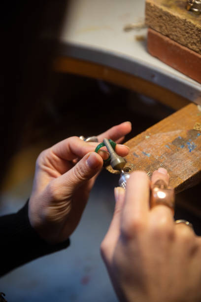istock Woman jeweller working 1465906080