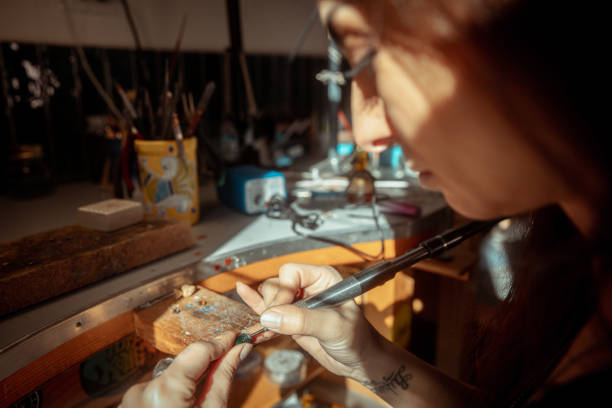 istock Woman jeweller working 1465906584
