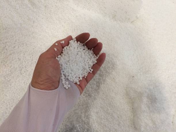 istock Urea chemical fertilizer in hand. 1465910464