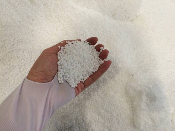 istock Urea chemical fertilizer in hand. 1465910478