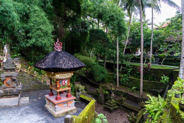 istock Balinese Hinduism temple in a deep tropical forest. 1465924372