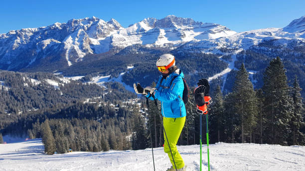 istock Woman alpine skier getting ready for a fun ride 1465924616