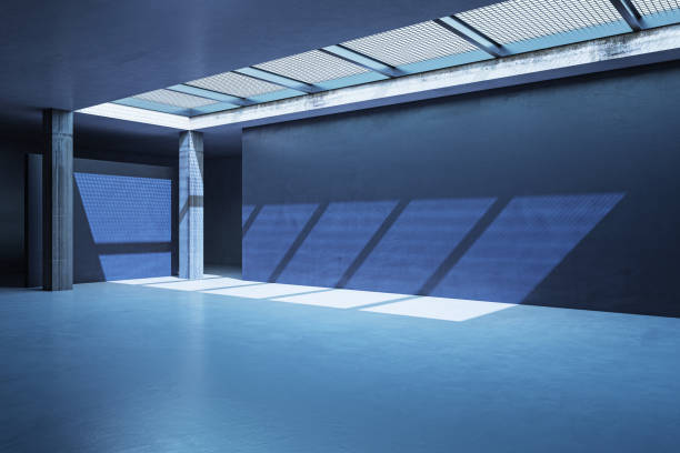 istock Perspective view on blank concrete floor with space for your product or car presentation in industrial style abstract hall area with sunlit dark blue wall background. 3D rendering, mockup 1465929281