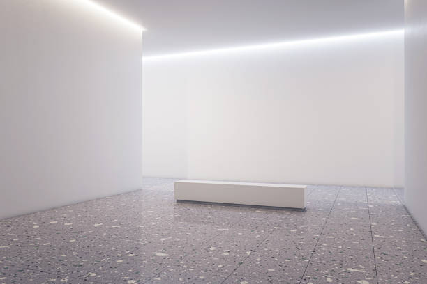 istock Perspective view on blank light wall background with place for advertising poster or product presentation in spacious abstract gallery hall with stone bench on concrete floor. 3D rendering, mockup 1465929581