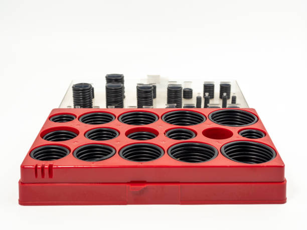 istock Hydraulic and pneumatic o-rings in black in different sizes on a white background. Rubber gaskets for plumbing. 1465930371