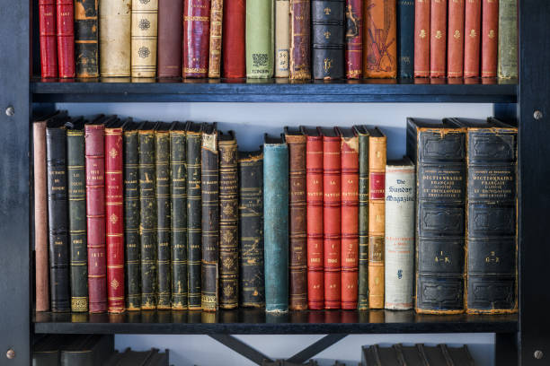 istock Antique 19th century books in bookshelf 1465931867