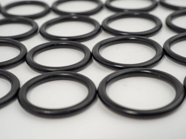 istock Hydraulic and pneumatic o-rings in black in different sizes on a white background. Rubber gaskets for plumbing. 1465934385
