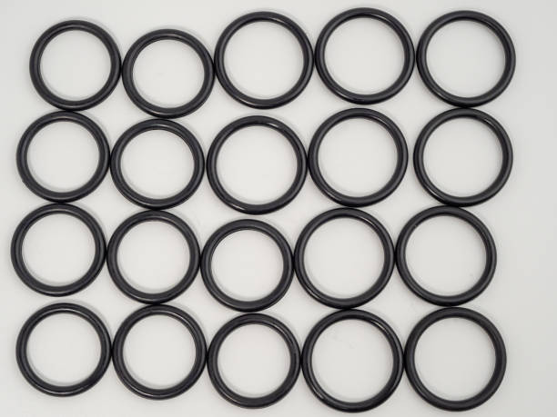 istock Hydraulic and pneumatic o-rings in black in different sizes on a white background. Rubber gaskets for plumbing. 1465934727