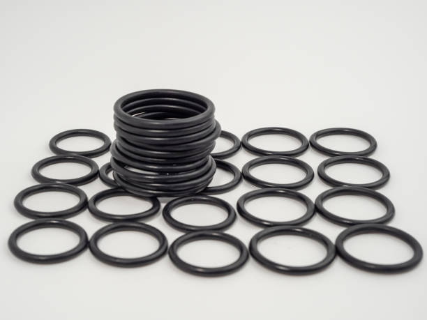 istock Hydraulic and pneumatic o-rings in black in different sizes on a white background. Rubber gaskets for plumbing. 1465935107