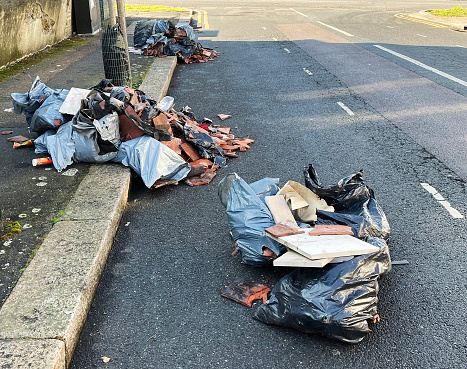 Fly tipping on an urban street in London