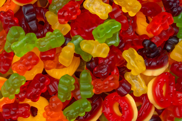 istock Assorted colorful gummy candies. Jelly donuts. Jelly bears. 1465945138