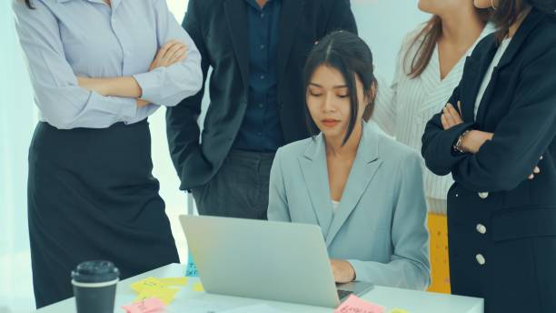 istock Business people proficiently discuss work project on computer . Corporate business team collaboration concept . 1465946405