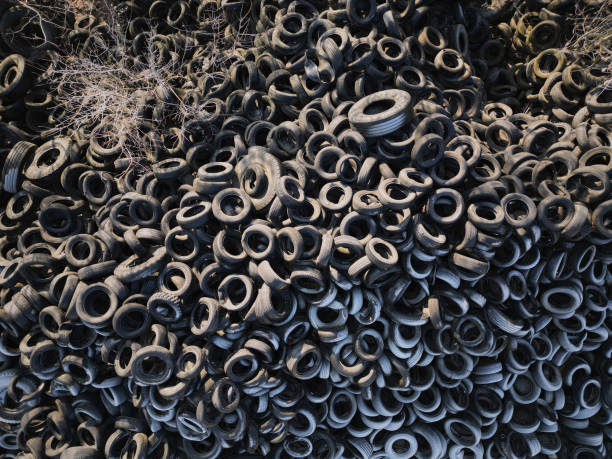 Aerial view of old tires. Many car and truck tires on dump site from above stock photo
