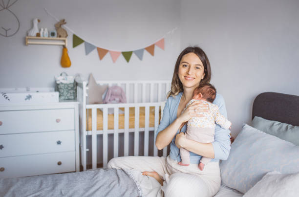 istock Mother with newborn baby 1465951211