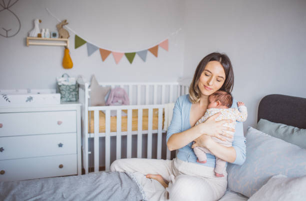 istock Mother with newborn baby 1465951260