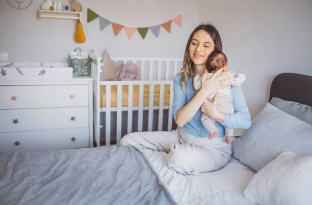 istock Mother with newborn baby 1465951309