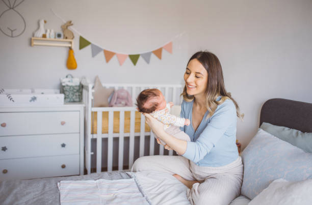 istock Mother with newborn baby 1465951825