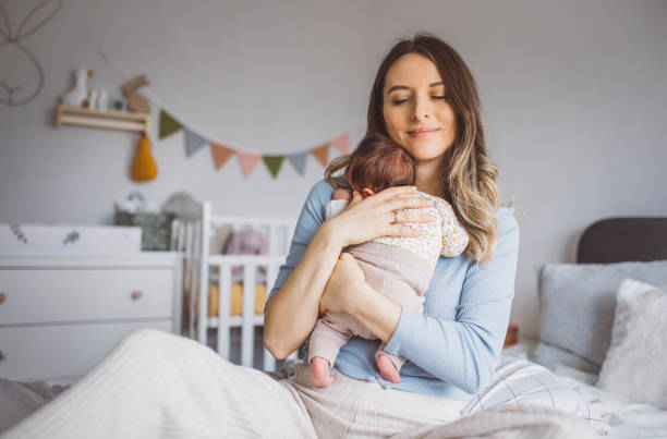 istock Mother with newborn baby 1465951875