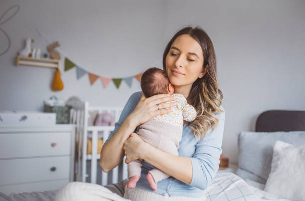 istock Mother with newborn baby 1465951942