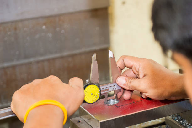 istock Close up scene the operator measuring inside diameter metal parts by dial Vernier caliper. 1465956676