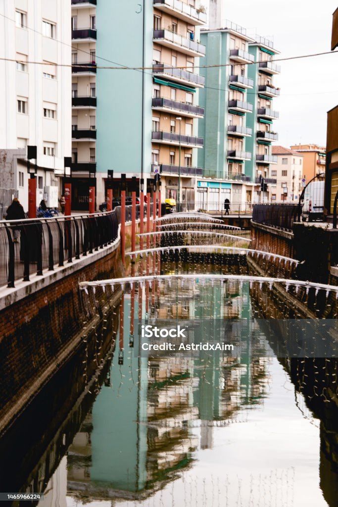 Mestre Reflection of green modernist buildings in a canal in Mestre, Italy. Architecture Stock Photo