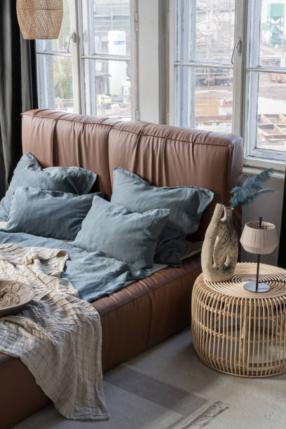 istock Modern bedroom with blue bedclothes on leather bed 1465970982