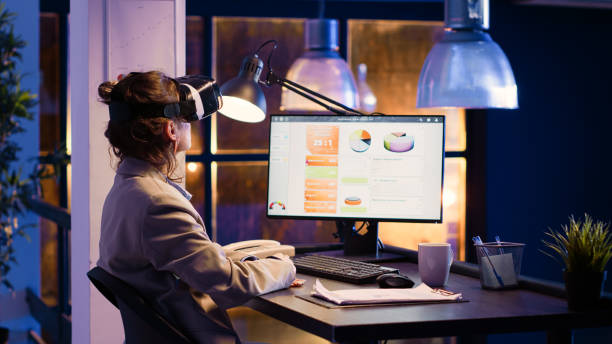 istock Corporate employee wearing virtual reality headset 1465994391