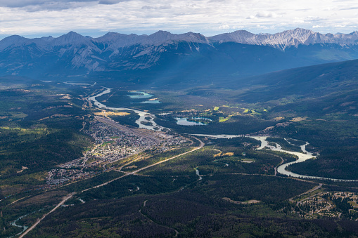 Jasper town and Athabasca river landscape with canadian rockies in background seen from Mount Whistler, Jasper national park, British Columbia, Canada.