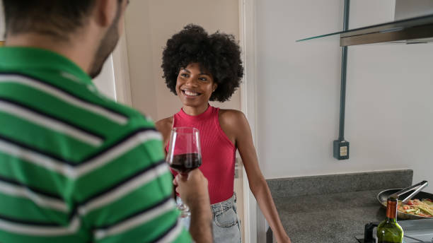 istock couple drinking and talking in the kitchen 1466014959