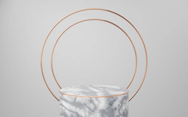 istock Empty white marble cylinder podium with gold border and copper circle on gray background. Abstract minimal studio 3d geometric shape object. Mockup space for display of product design. 3d rendering. 1466014960