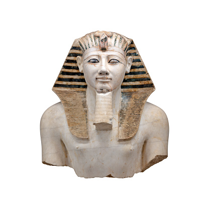 Upper part of a statue of ancient Egytpiant pharaoh Thutmose III, isolated limestone head and torso of a king of Egypt