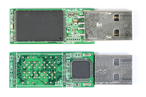 Disassembled flash drive on a white background. High resolution photo. Full depth of field.