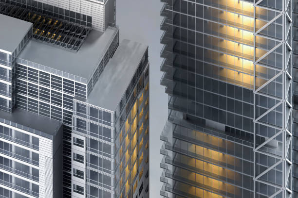 istock Glass and steel office building with illuminated windows, view on rooftops 1466028060