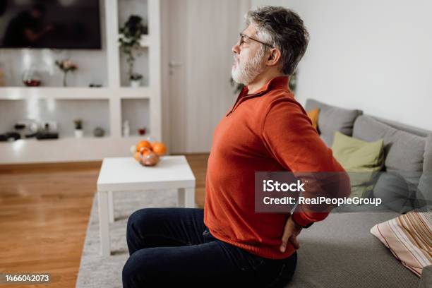 I Should Stretch More Often Stock Photo - Download Image Now - Backache, Back, Stretching