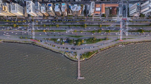 istock Buildings with highways close to a maritime pier 1466045570