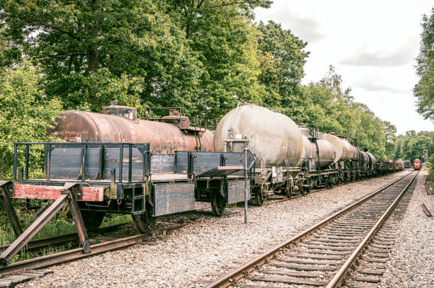 istock Old freight train railway carts in the countryside 1466058653