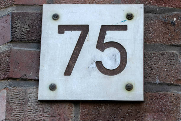 istock Close Up House Number 75 At Amsterdam The Netherlands 1466072342
