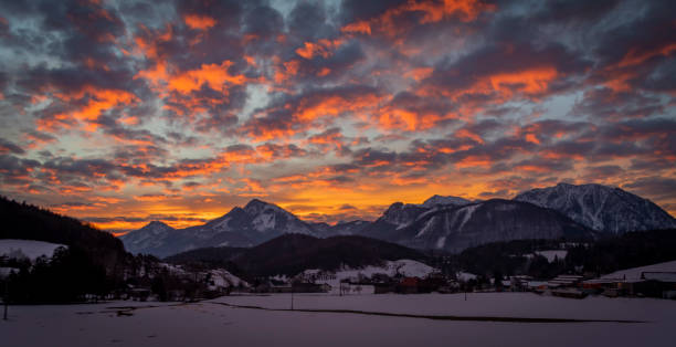 Winter morning with color clouds and big dark hills Winter morning with color clouds and big dark nice hills spital am pyhrn stock pictures, royalty-free photos & images