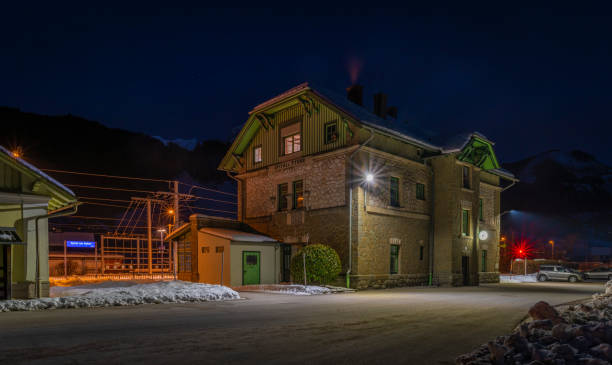 Winter evening over Spital am Pyhrn in Austria with railway station Winter evening over Spital am Pyhrn in Austria with railway small station spital am pyhrn stock pictures, royalty-free photos & images