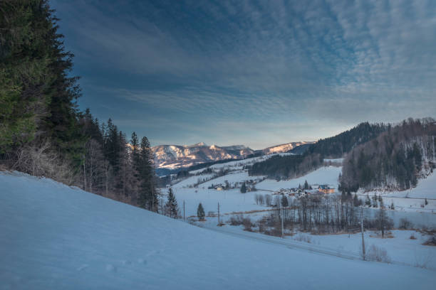 istock Winter evening in Spital am Pyhrn in Austria with railway tracks 1466081459