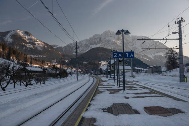 Winter evening in Spital am Pyhrn in Austria with railway station Winter evening in Spital am Pyhrn in Austria with railway small station spital am pyhrn stock pictures, royalty-free photos & images