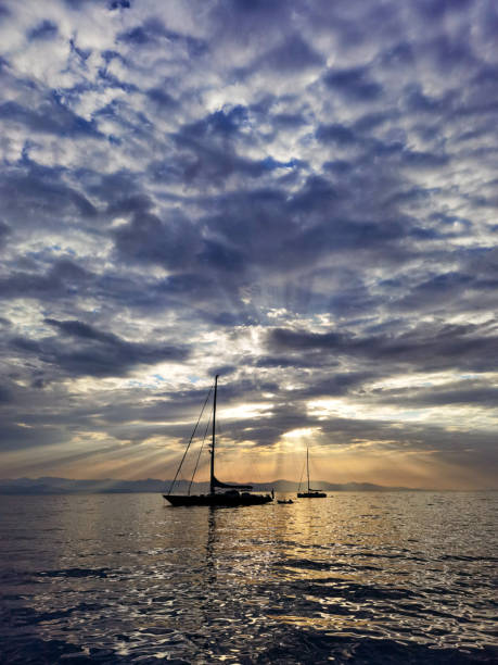 istock Sailboats against beautiful sky at dawn 1466084642